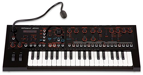 The Roland JD-XI 37-Key Synthesizer, showcasing its sleek design, pattern sequencer, and vocoder capabilities for live performances. 