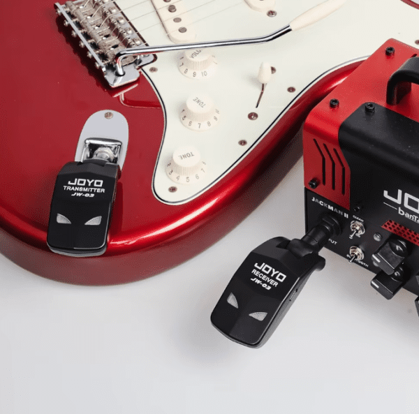 Portable JOYO JW-03 Wireless Guitar System with 2.4GHz transmission, built-in rechargeable battery, and over 20m range, perfect for electric guitars and bass amps.