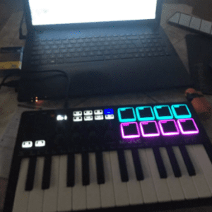 Portable 25-Key MIDI Keyboard Controller with Wireless Function & RGB Pads for Music Creation - Image 2
